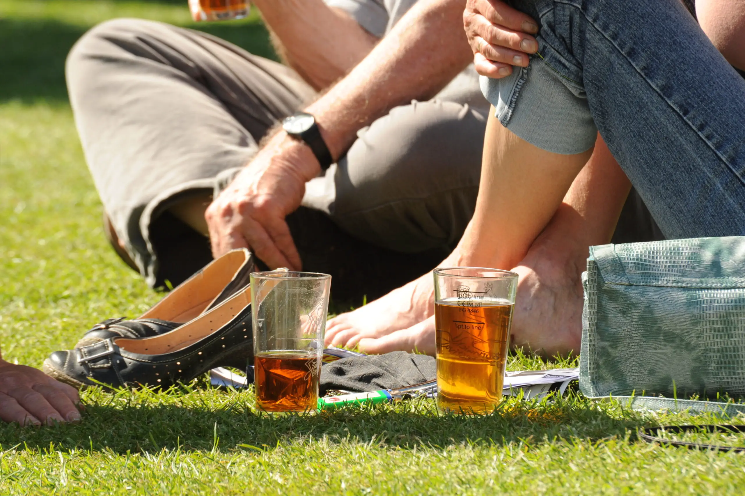 Couple Drinking Beer on Lawn