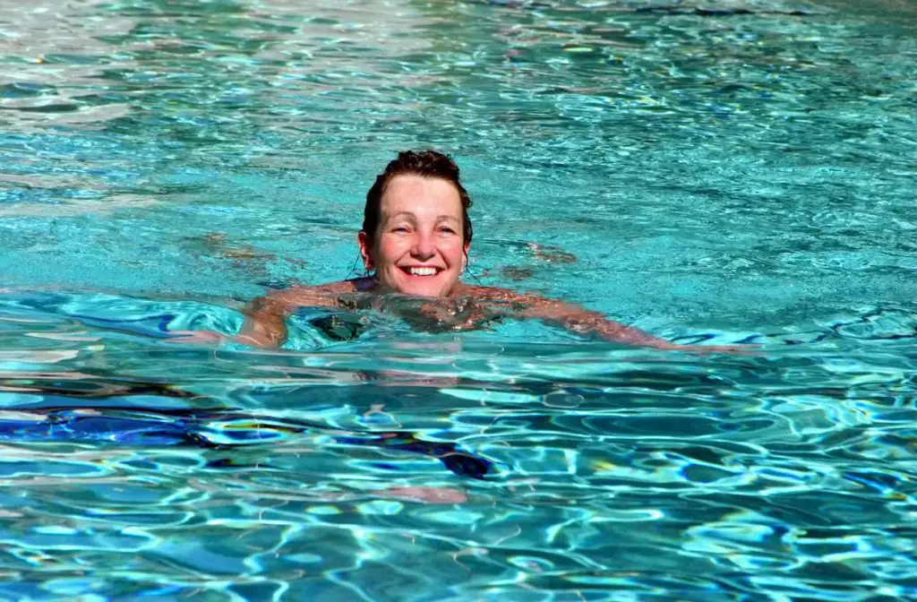 woman swimming in a pool 